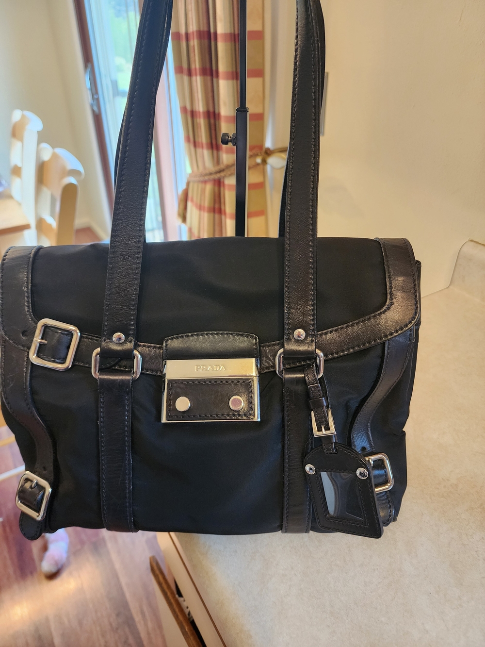Prada Tessuto nylon shoulder bag featuring black leather trim and silver buckle